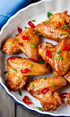 Chicken thighs in tomato and pepper sauce