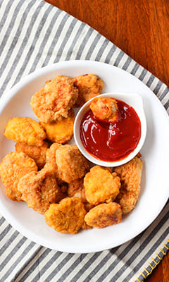 Курячі нагетси із соусом «Журавлина»