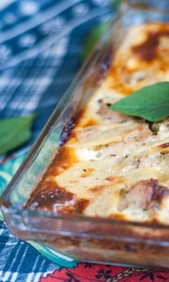 Chicken with potatoes covered with cheese