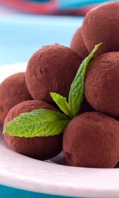 Сhocolate truffles in cocoa