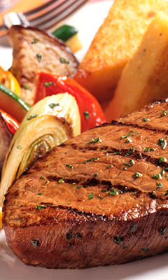 Steak with maple syrup with cranberry sauce