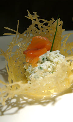Appetizer with salmon and ricotta in cheese buscets
