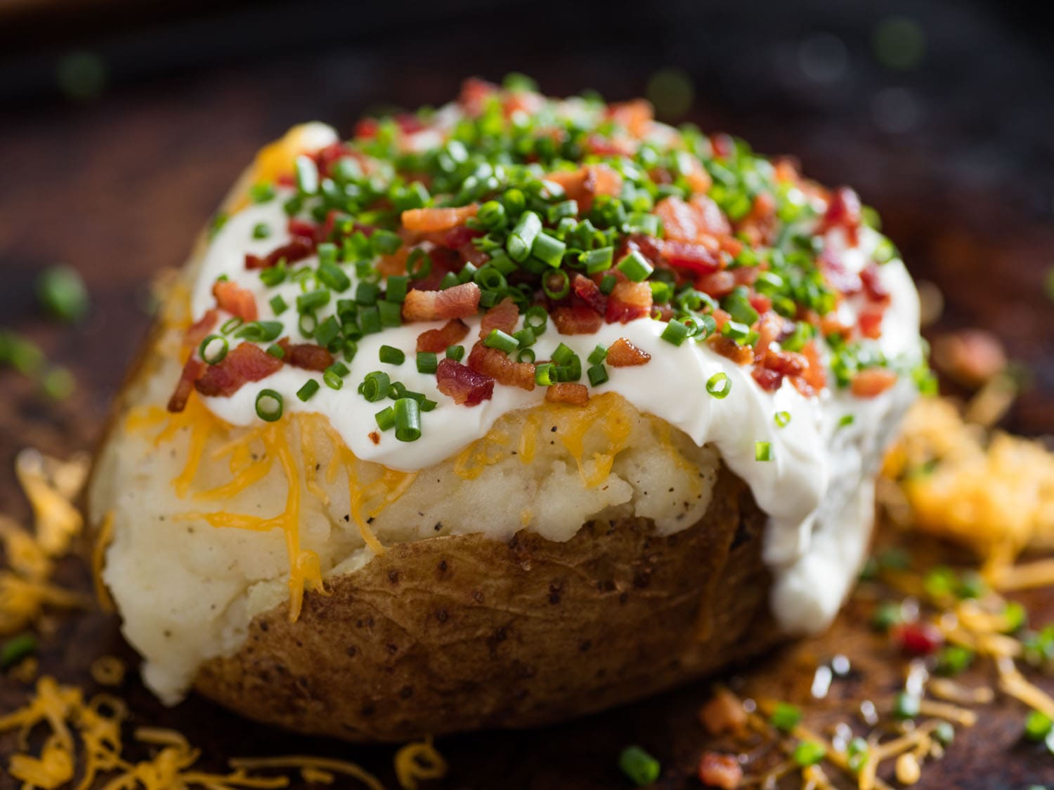 Baked potato with brynza and cheese with spices
