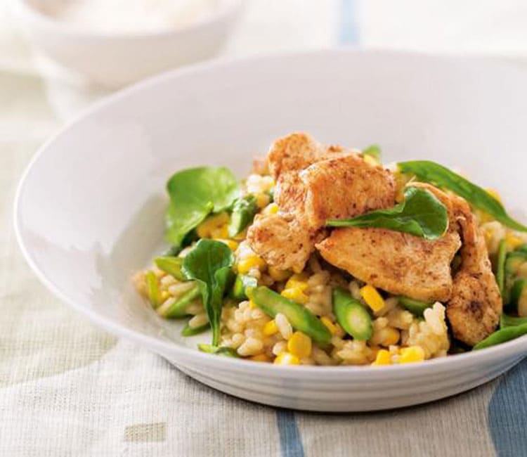 Creamy risotto with chicken, vegetables and cheese